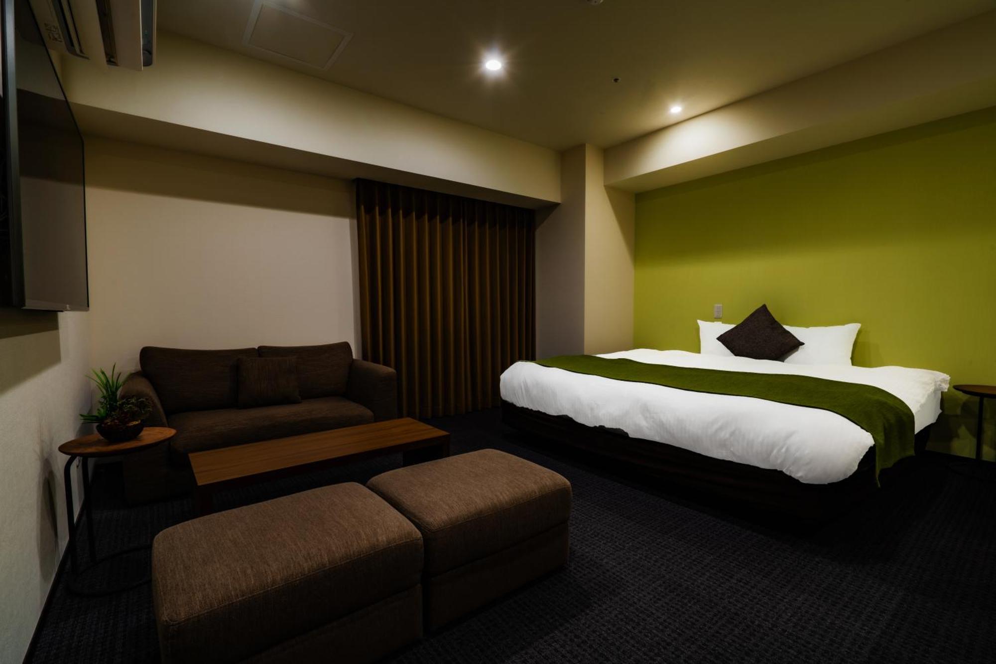 Randor Hotel Sapporo Suites Habitación foto A room at the hotel
