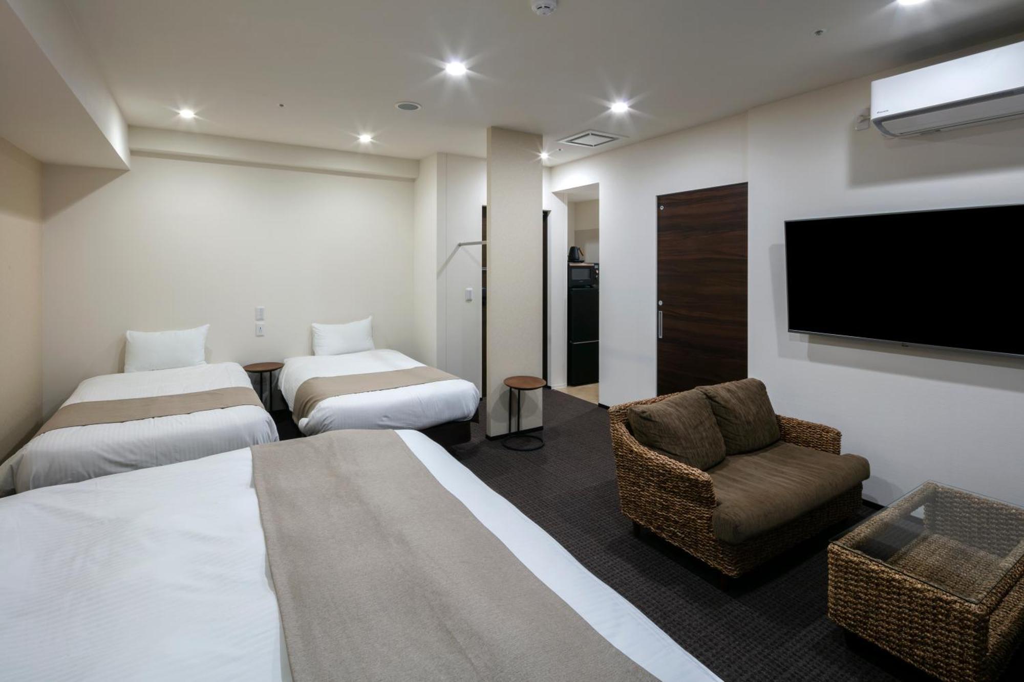 Randor Hotel Sapporo Suites Habitación foto A typical room at the hotel