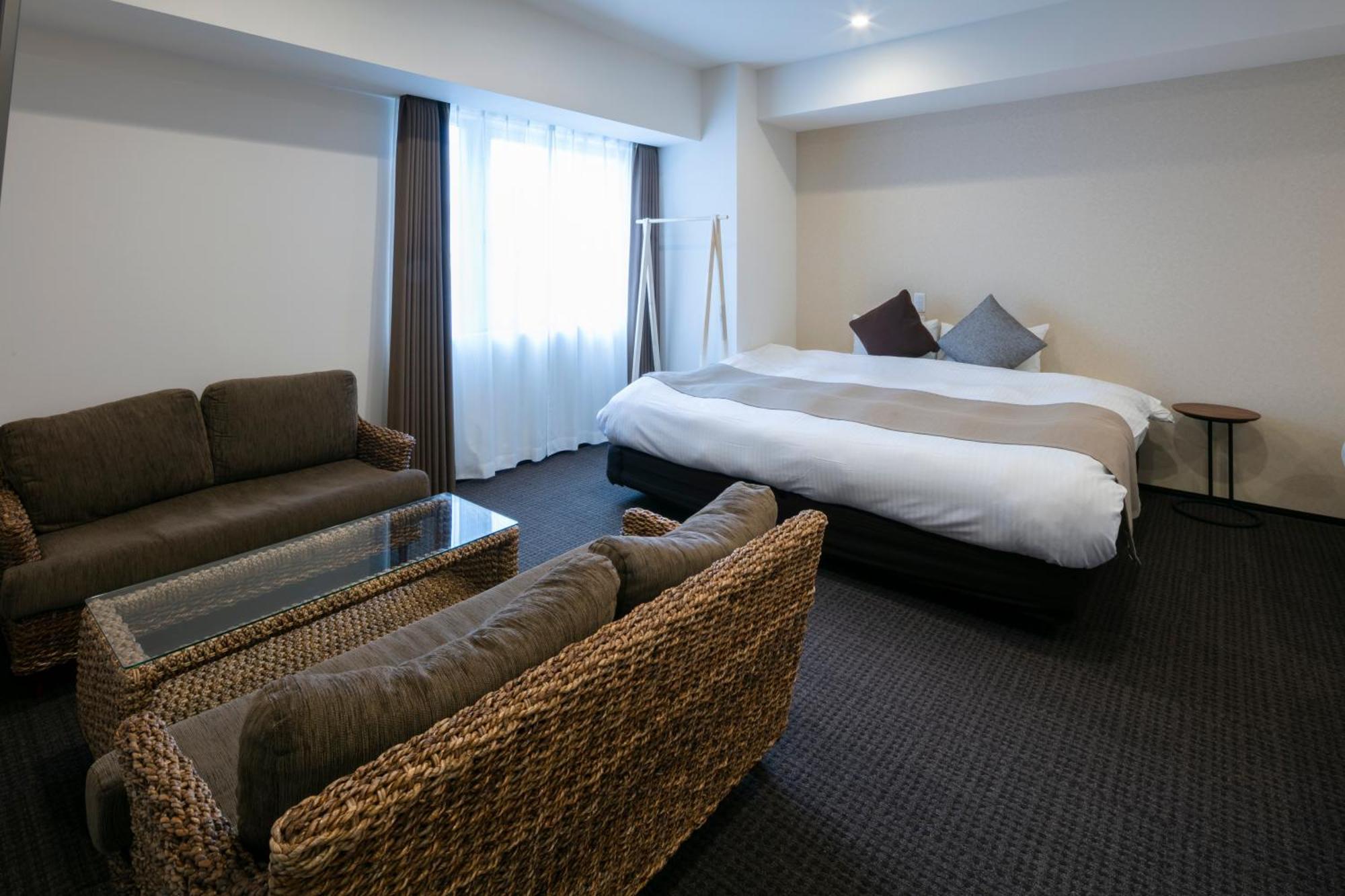 Randor Hotel Sapporo Suites Habitación foto A room at the hotel