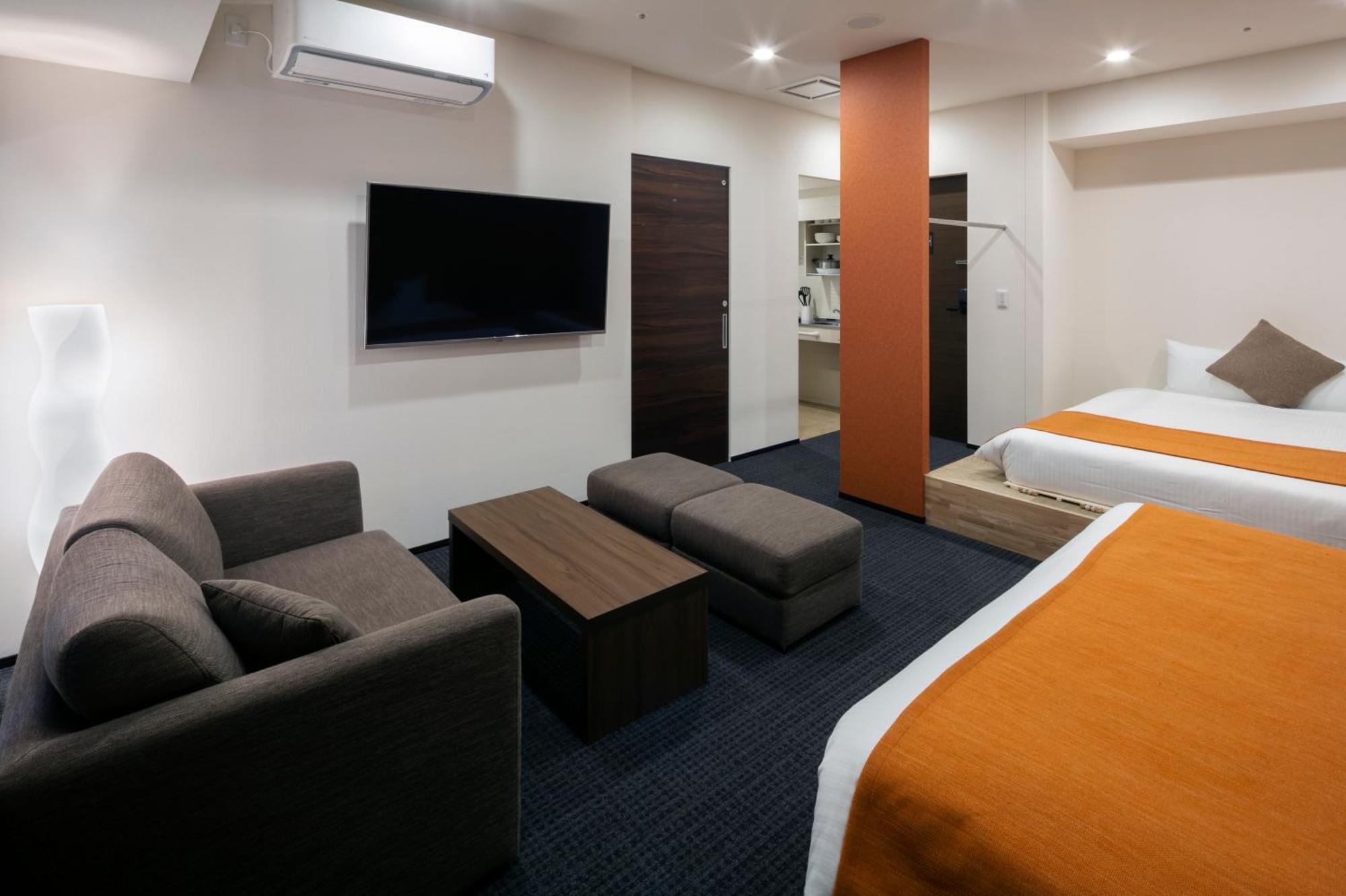 Randor Hotel Sapporo Suites Habitación foto A room at the hotel