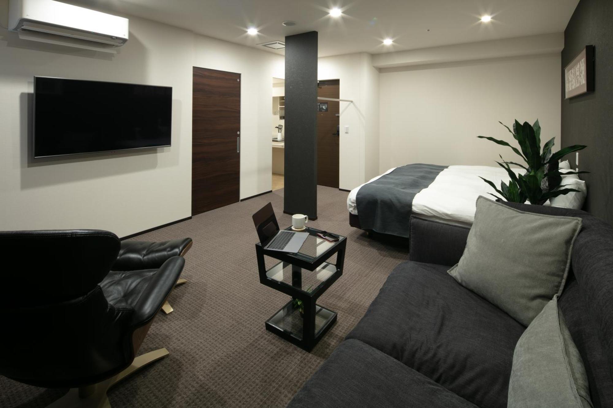 Randor Hotel Sapporo Suites Habitación foto A room at the hotel