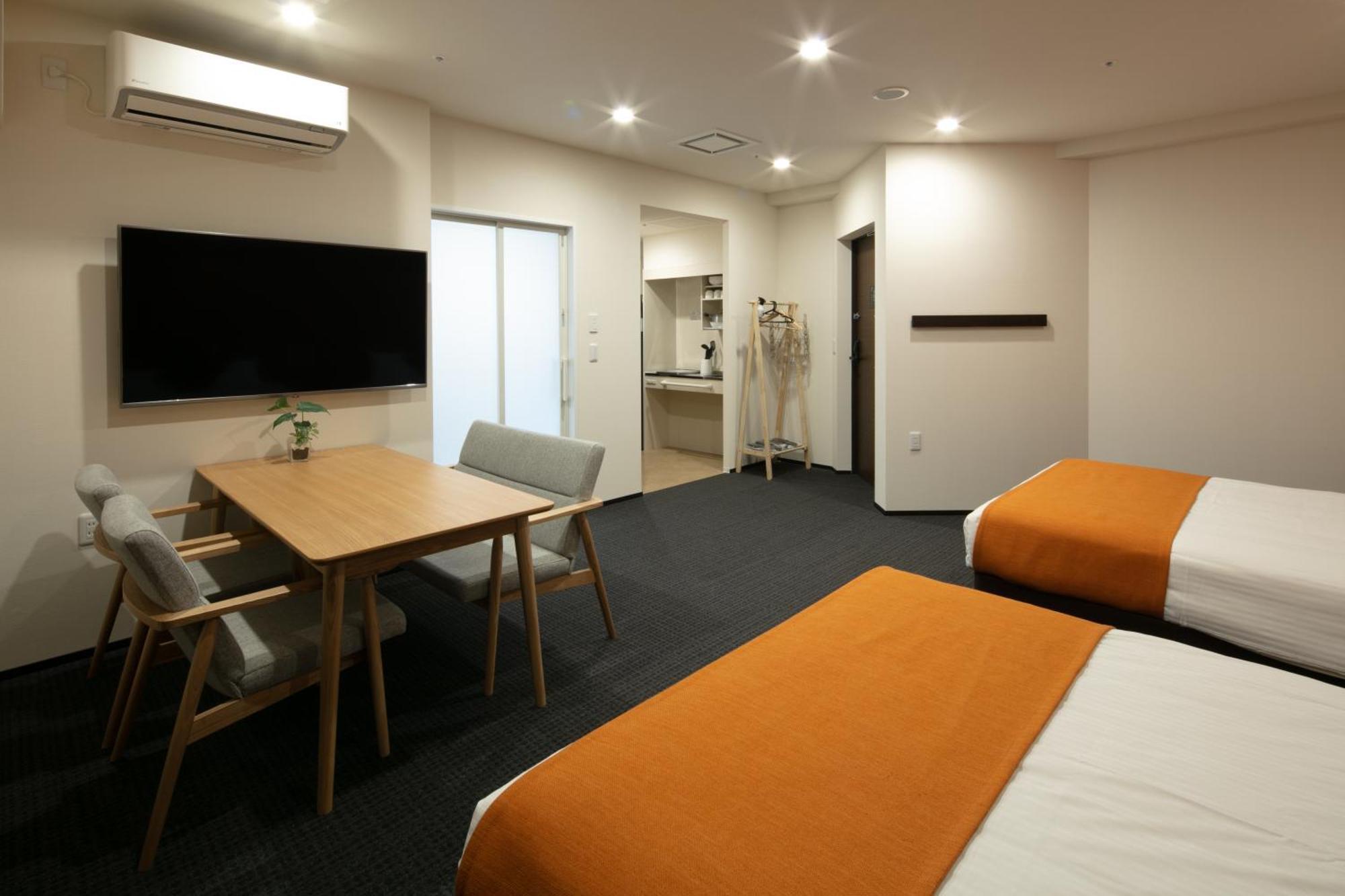 Randor Hotel Sapporo Suites Habitación foto A typical room at the hotel
